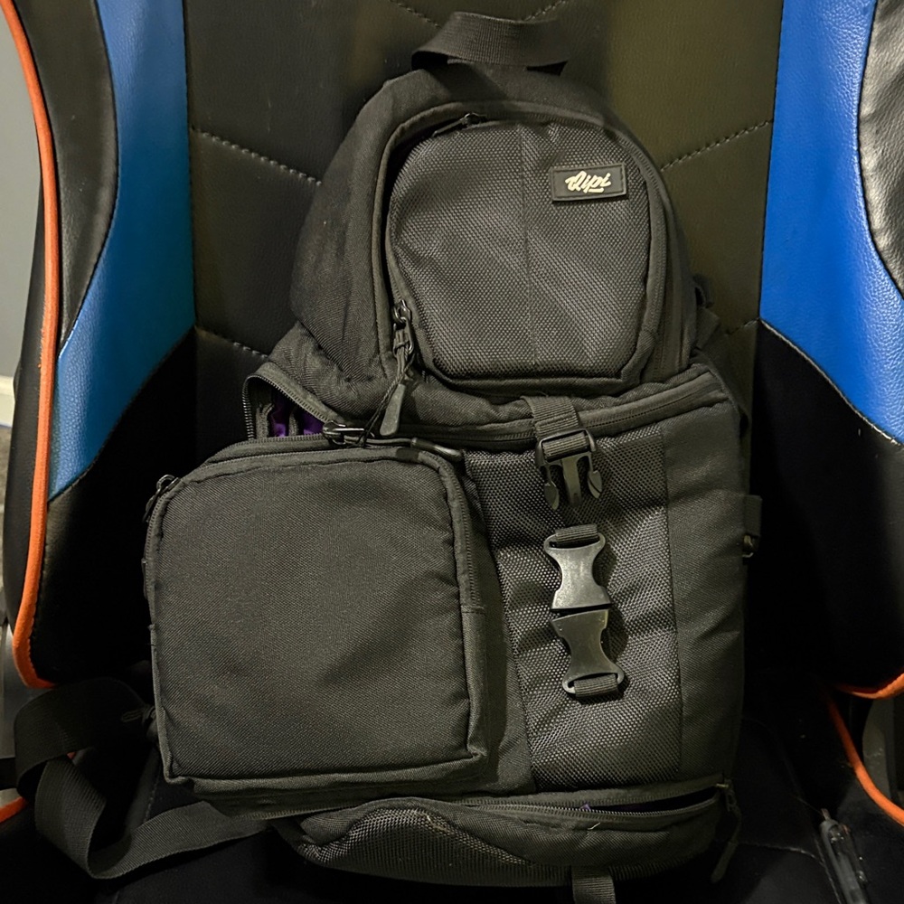 Qipi sling style camera bag